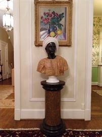 FABBY hand carved Italian marble Blackamoor bust, on 3-part matching marble stand. This thing is solid marble, is beautifully carved and very HEAVY! Just look at that expression. You can tell from his rock hard countenance, you'll soon be singing a duo with Madelyn Khan, "Oh, sweet mystery of life, at last I've found you!" Above his head, a yummy original still life oil painting, by Louise-Jeanne Cottard Fossey (1902 - 1983); another nice investment piece of art - great frame! She measures 24" W x 27" T.