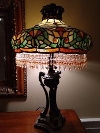 One of a pair of mee-maw, Tiifany style stained glass table lamps.