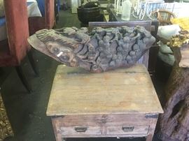 One of four handcarved architectural 19th century corbels resting on one of two seating low desks with fitted interior and drawers.