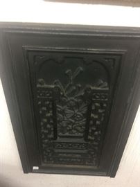 Carved American aesthetic period ebonzied wall panel.