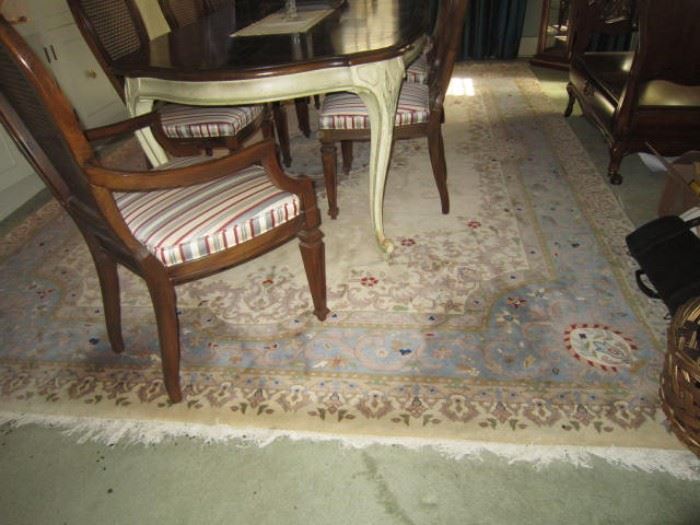One of 2 large oriental rugs and a smaller matching rug