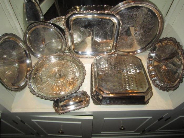 Lots of great silver plate pieces including the plateau in the foreground