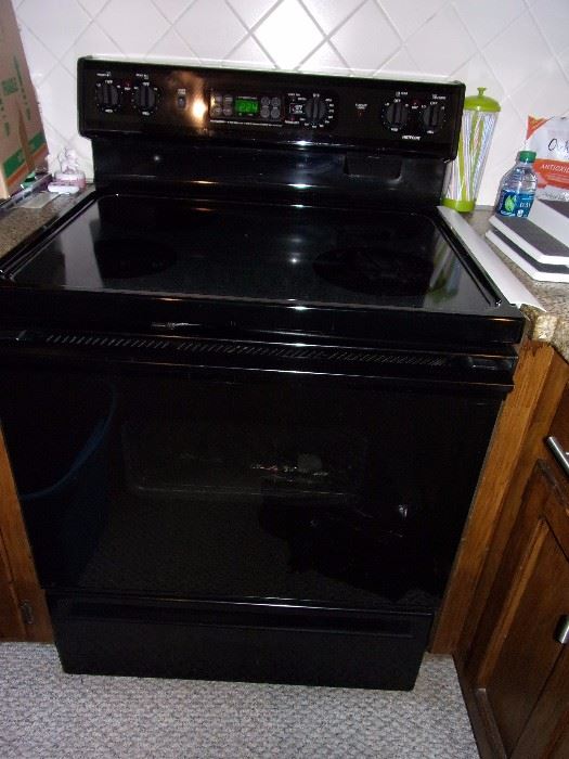 Black ceramic stove top and oven
