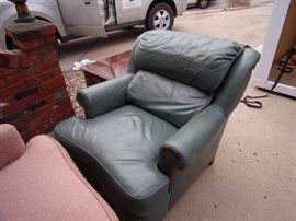 Leather chair has matching ottoman