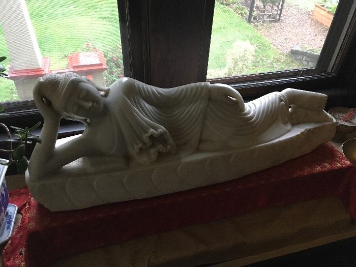 Large marble reclining Buddha sculpture
