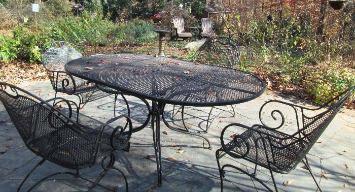 Wrought Iron Dining Table & four Chairs & Umbrella & Cushions