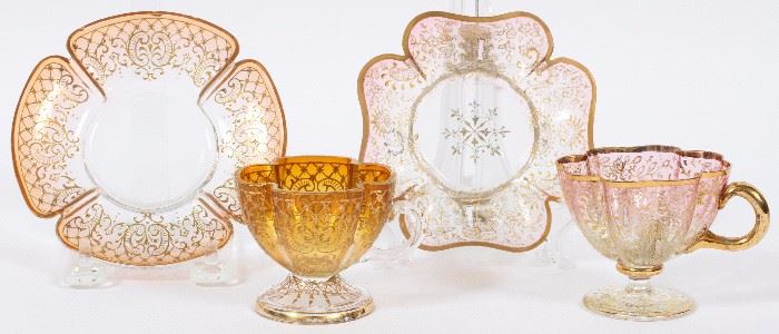 1068 - MOSER AND VENETIAN GILT ENAMELED GLASS TEACUPS AND SAUCERS, TWO SETS, W 4 1/4"-5"