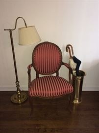 Brass: lamp, umbrella stand, fireplace set. A pair of these striped chairs available.
