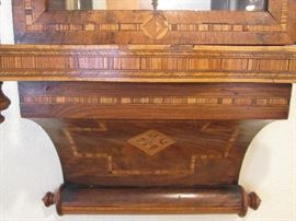Stunning inlay work on the clock case
