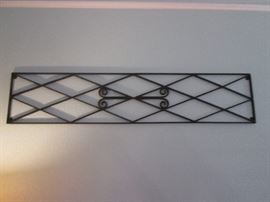 Assorted metal Art Pieces both inside and on the patio.