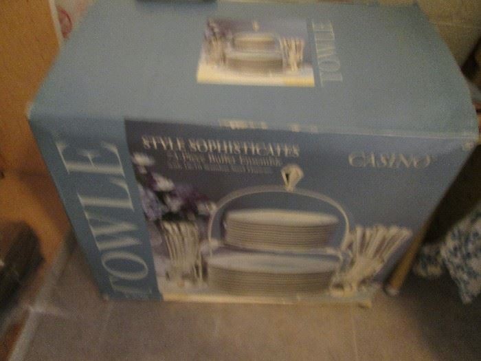 Towle "Style Sophticates, Casino Set, NIB.  This set is service for 12 and includes 2-Plate sizes and Flatware, with a Holding Rack.