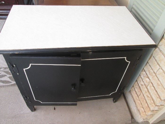 Black Cabinet with white trim