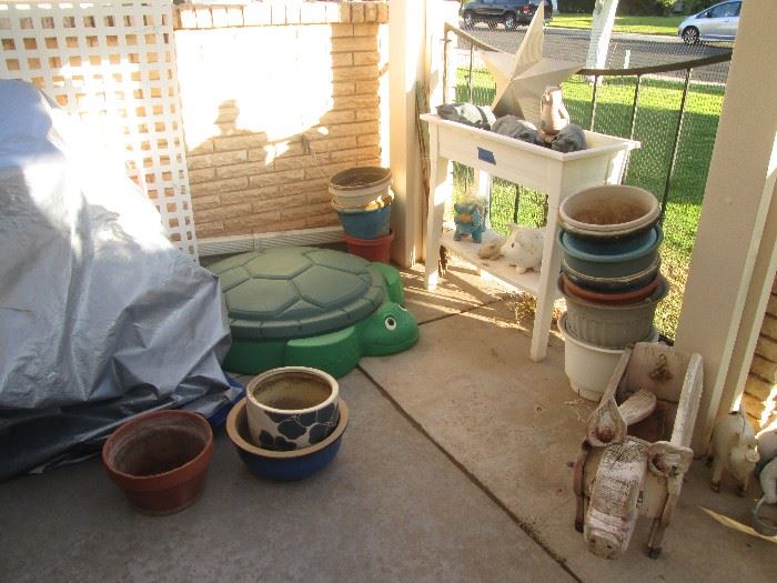 Pots for planting and a Turtle hiding in the corner???