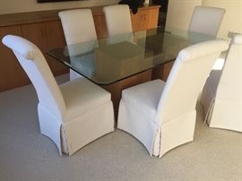 12. Glass Topped Dining Table w/ Two Oak Wood Bases (40" x 78" x 30")                                                               13. 6 Parsons Dining Chairs Covered in Cream Canvas (20" x 24" x 41")