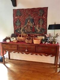 Sideboard, brass lamp, baskets & tapestry