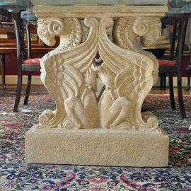Outstanding one of a kind 3/4" thick glass top dining table with 2 carved stone pedestals with each featuring double ram's head griffins
