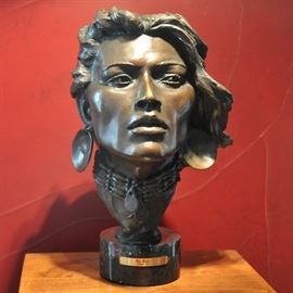 Grant Speed bronze entitled "Captive", 13 by 8 by 8 on black marble base