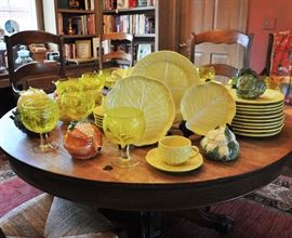 Yellow cabbage leaf dinner ware from Portugal and matching cabbage leaf glasses (SOLD AT PREVIEW) along with Vietri covered fruit and vegetable shaped pieces
