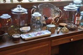 Large glass jars in many sizes and shapes, Fitz and Floyd pheasant teapot, Gien hand colored trays and saucer, (wine is not for sale)