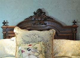 Detail of headboard and linens