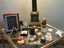 Little treasures at the base of a Wildwood lamp on a mid century brass and glass table