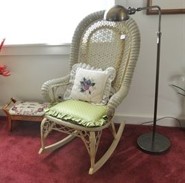 Antique wicker rocker and a brass reading lamp