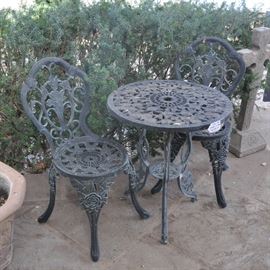 A nice bistro set that will come with just a little dust.