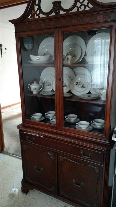 Beautiful China Cabinet with One of MANY sets of China.....