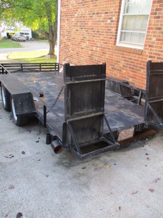 Large utility trailer.  Rated for car cargo.