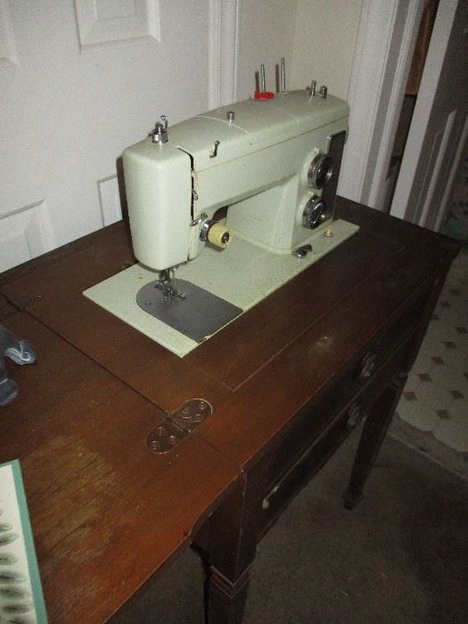 Singer sewing machine. One of three remaining.
