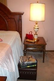 OCCASIONAL TABLE WITH ONE OF A PAIR OF LAMPS