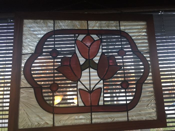 Stained glass...sorry there are blinds behind.