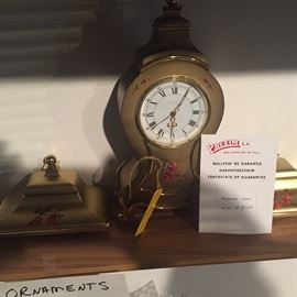 Vintage Prexim clock ..has two matching wall shelves..very sweet! This is a petite piece clock is maybe 8"