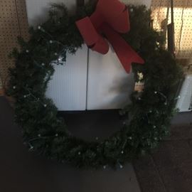 A gorgeous already lighted wreath for your garage...it's large 