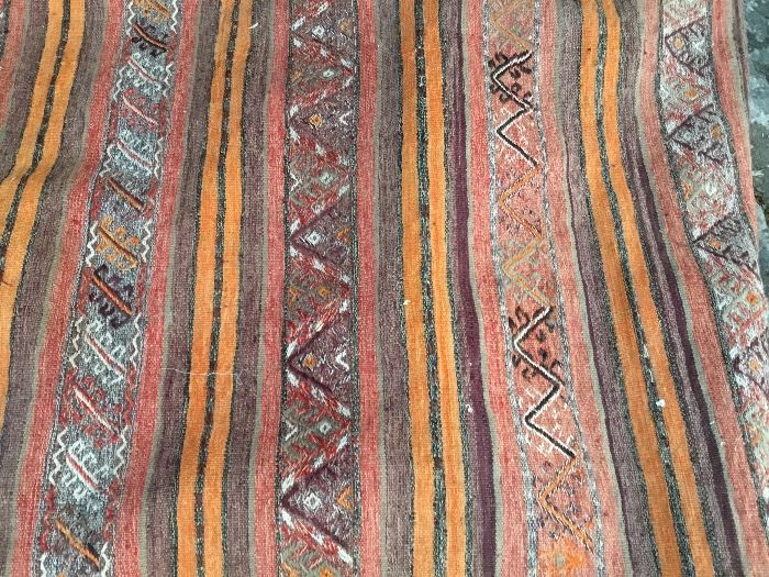 Long hand stiched and hand knotted rug $450