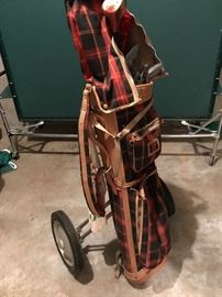 Vintage PATTY BERG golf clubs and pull cart. $120