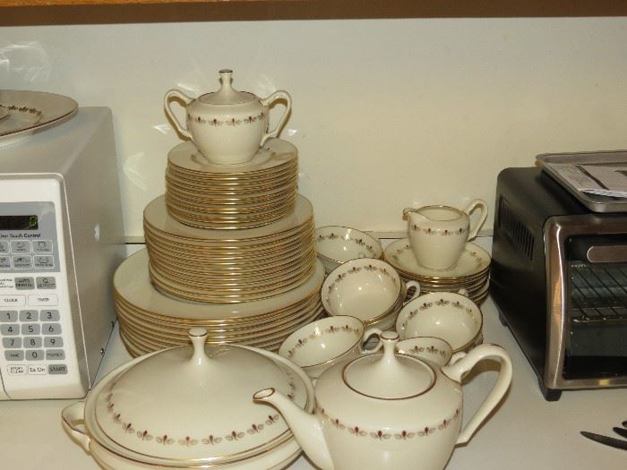 12 piece place setting of Romance by Lenox includes platter, covered vegetable, cream and sugar, teapot and gravy boat