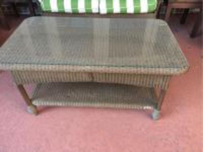 Wicker and glass outdoor coffee table