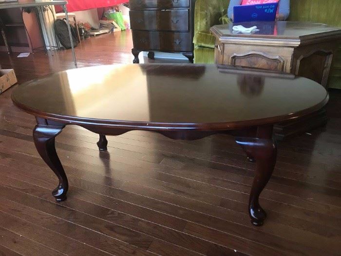 #7 qa leg oval coffee table wood 46x27x17 $100.00