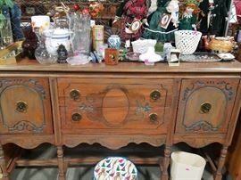 Sideboard with paint detail.