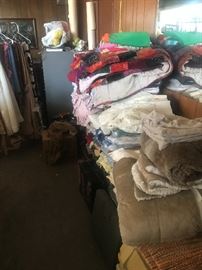 Lots & lots of bed linens, throws, quilts, scams, sheets, drapes, etc.