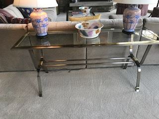 Contemporary glass and metal console table with Ted Keller Pottery bowl