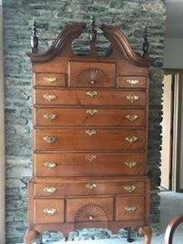 18th c. Highboy with flame finials