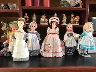 Group of storybook character dolls