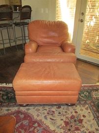 LEATHER CHAIR AND OTTOMAN  