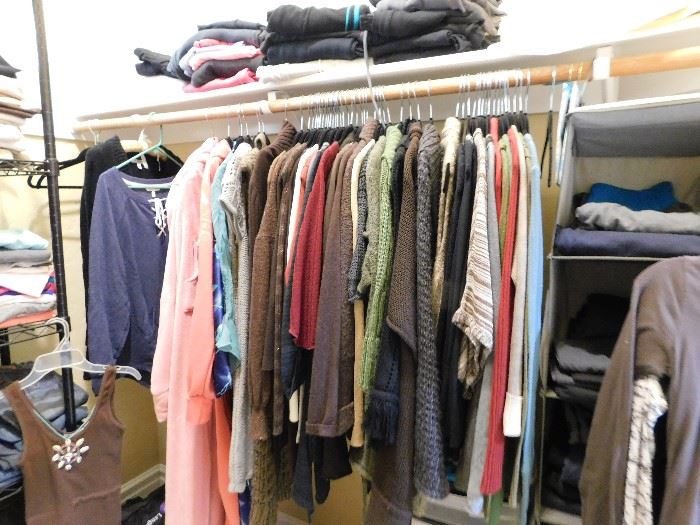 Designer clothes of all kinds, many with tags still on, but all in new or near new condition