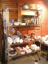 Large kitchen pantry shelves are full of a variety of Cooking and Serving Items.....Copper, Brass, Stainless Steel, Ironstone and Ceramic.  Shelves available too.