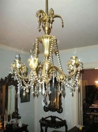1 of many Antique Crystal and Brass Chandeliers.....this is the small one.