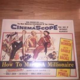Marilyn Monroe, Betty Grable "How To Marry A Millionaire" mounted poster, autographed by Betty Grable, Marilyn Monroe 