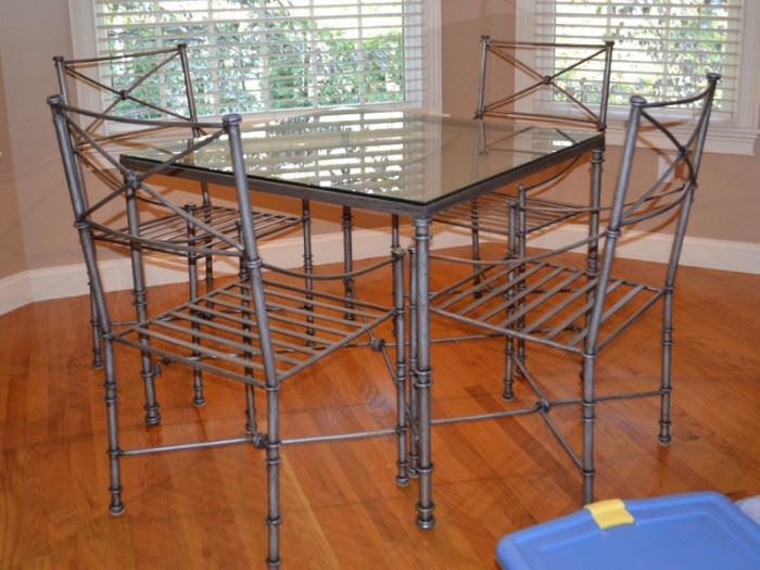 Glass top kitchen table with 4 chairs from Pier 1